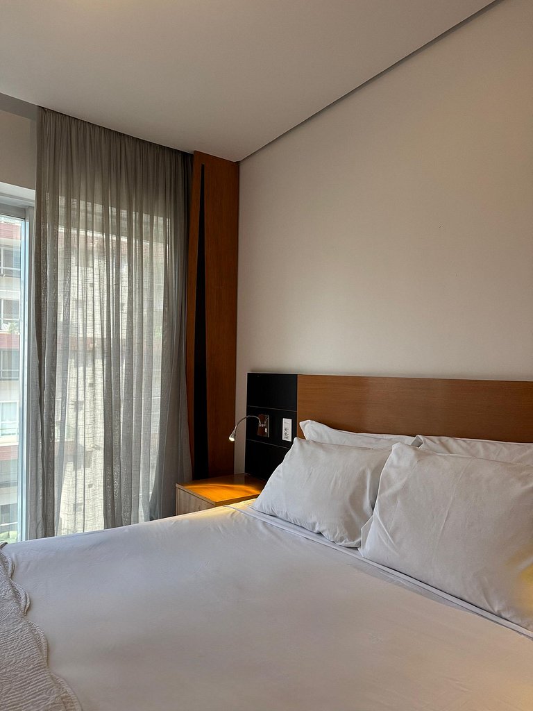 Get a Flat 701–Suíte com Terraço e Parede de Vidro | Ibirapu